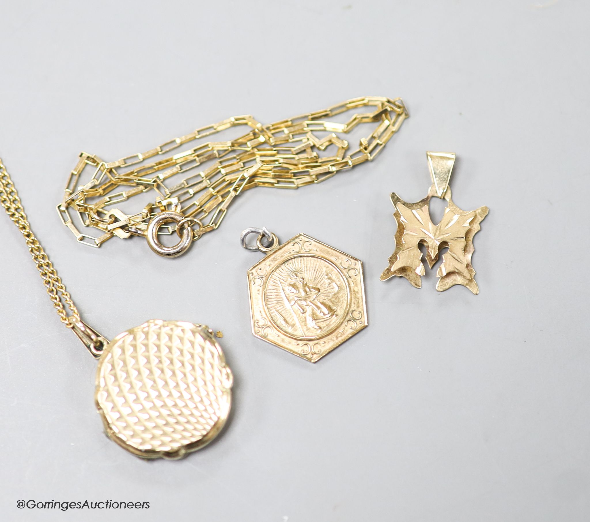 Two modern 9ct gold fine link chains, one with locket and two other 9ct gold pendants